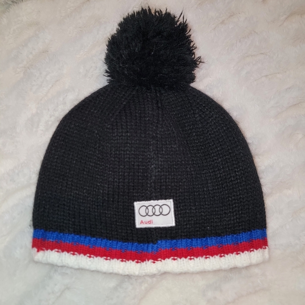 Kootenay Audi Black Knit Pom Beanie with Red & Blue Trim